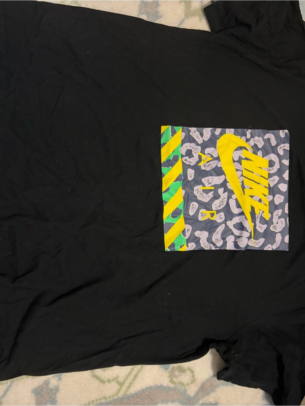 Nike Black Short-Sleeve Tee with Yellow Swoosh and Green Accent